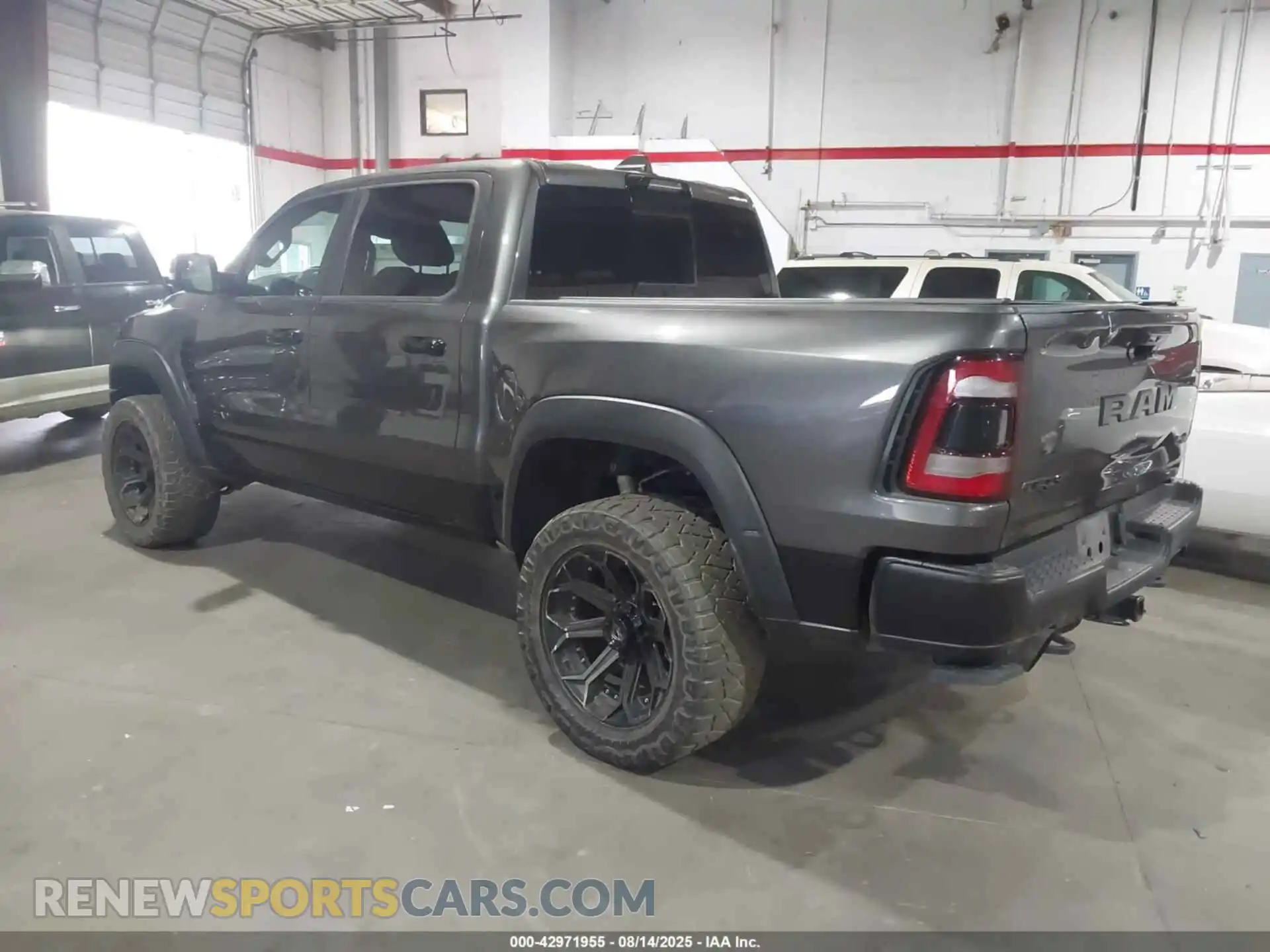 3 Photograph of a damaged car 1C6SRFU99PN500611 RAM 1500 2023