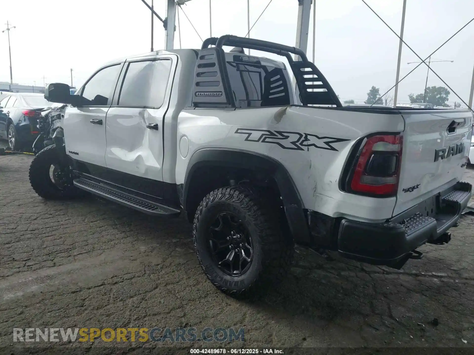 3 Photograph of a damaged car 1C6SRFU99PN592061 RAM 1500 2023