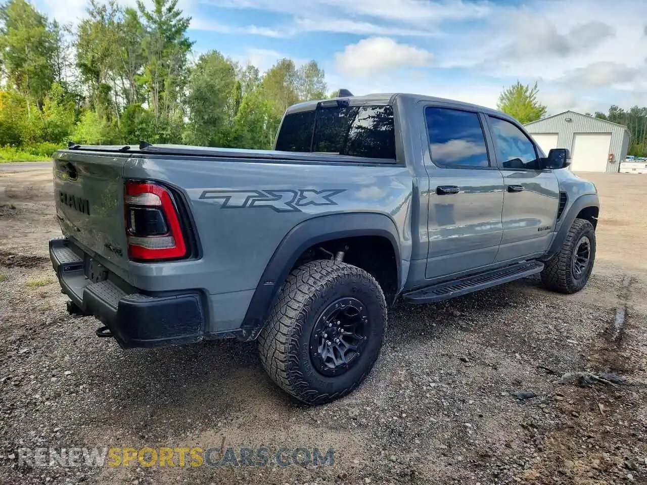 3 Photograph of a damaged car 1C6SRFU99PN648872 RAM 1500 2023