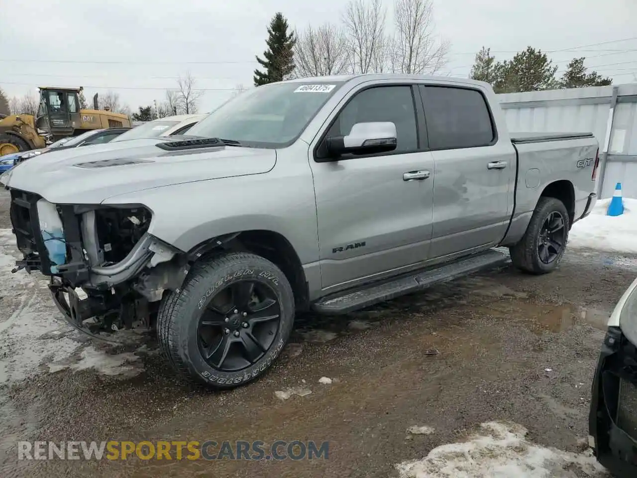 1 Photograph of a damaged car 1C6SRFVT7PN680987 RAM 1500 2023