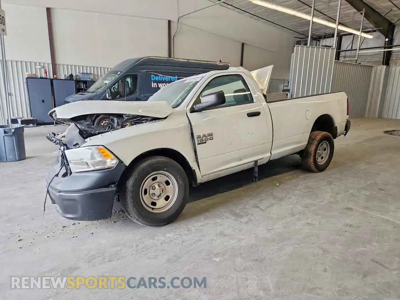 1 Photograph of a damaged car 3C6JR6DG2PG655231 RAM 1500 2023