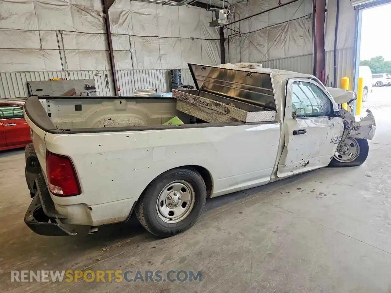 3 Photograph of a damaged car 3C6JR6DG2PG655231 RAM 1500 2023