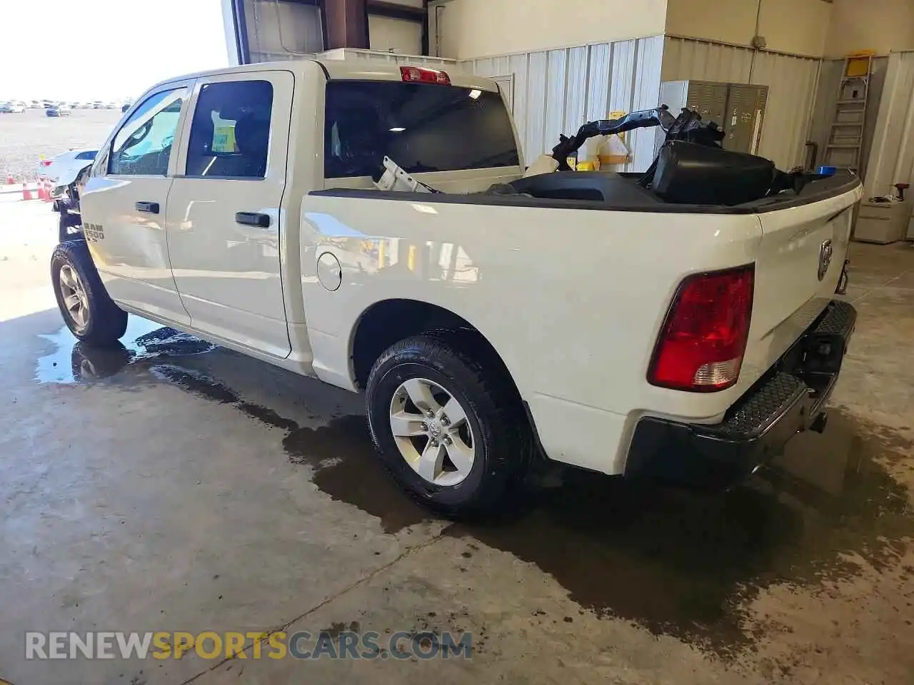 2 Photograph of a damaged car 3C6RR6KT2PG674638 RAM 1500 2023