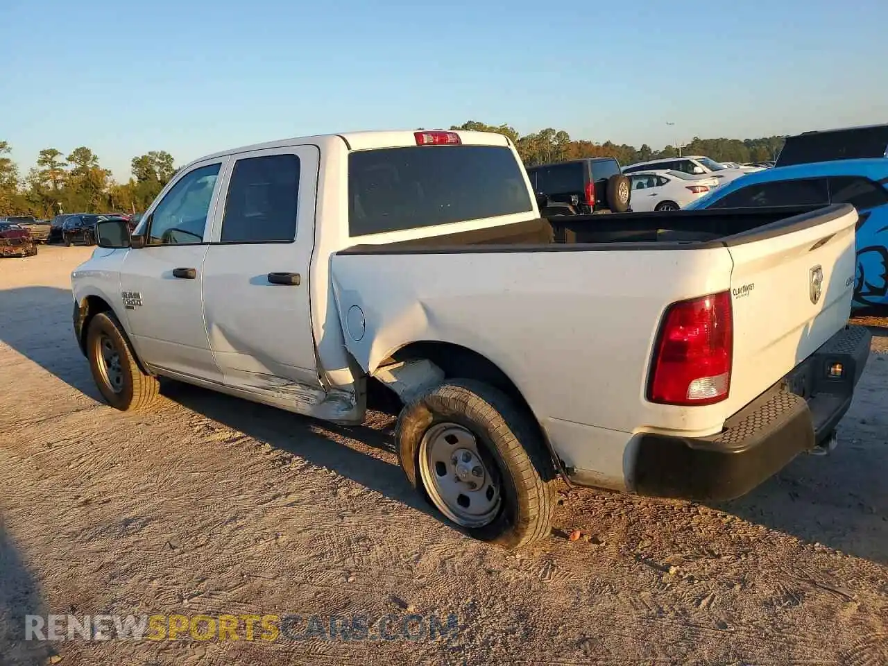 2 Photograph of a damaged car 3C6RR7KG6PG681763 RAM 1500 2023