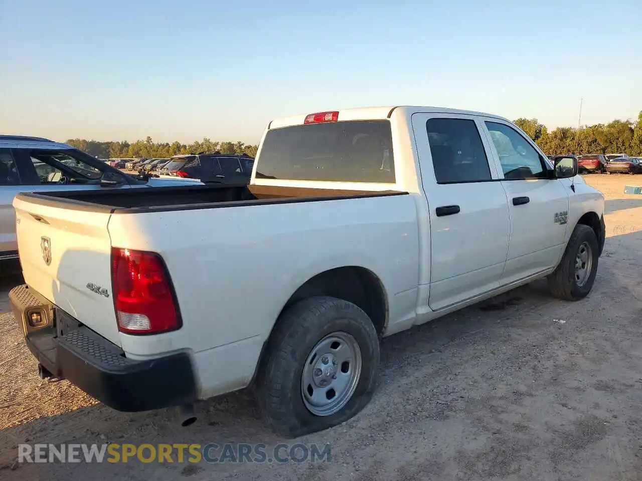 3 Photograph of a damaged car 3C6RR7KG6PG681763 RAM 1500 2023