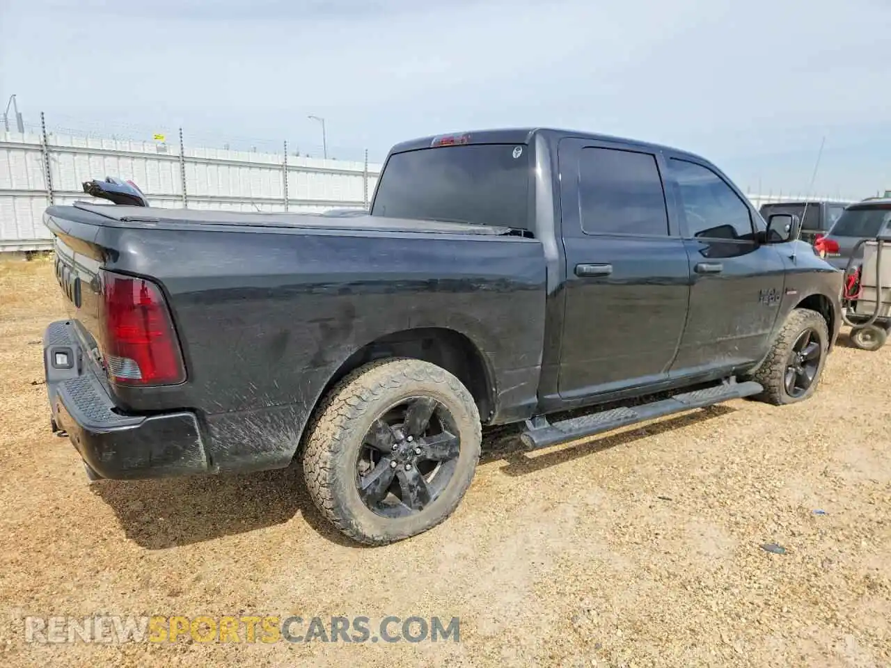 3 Photograph of a damaged car 3C6RR7KT2PG560287 RAM 1500 2023