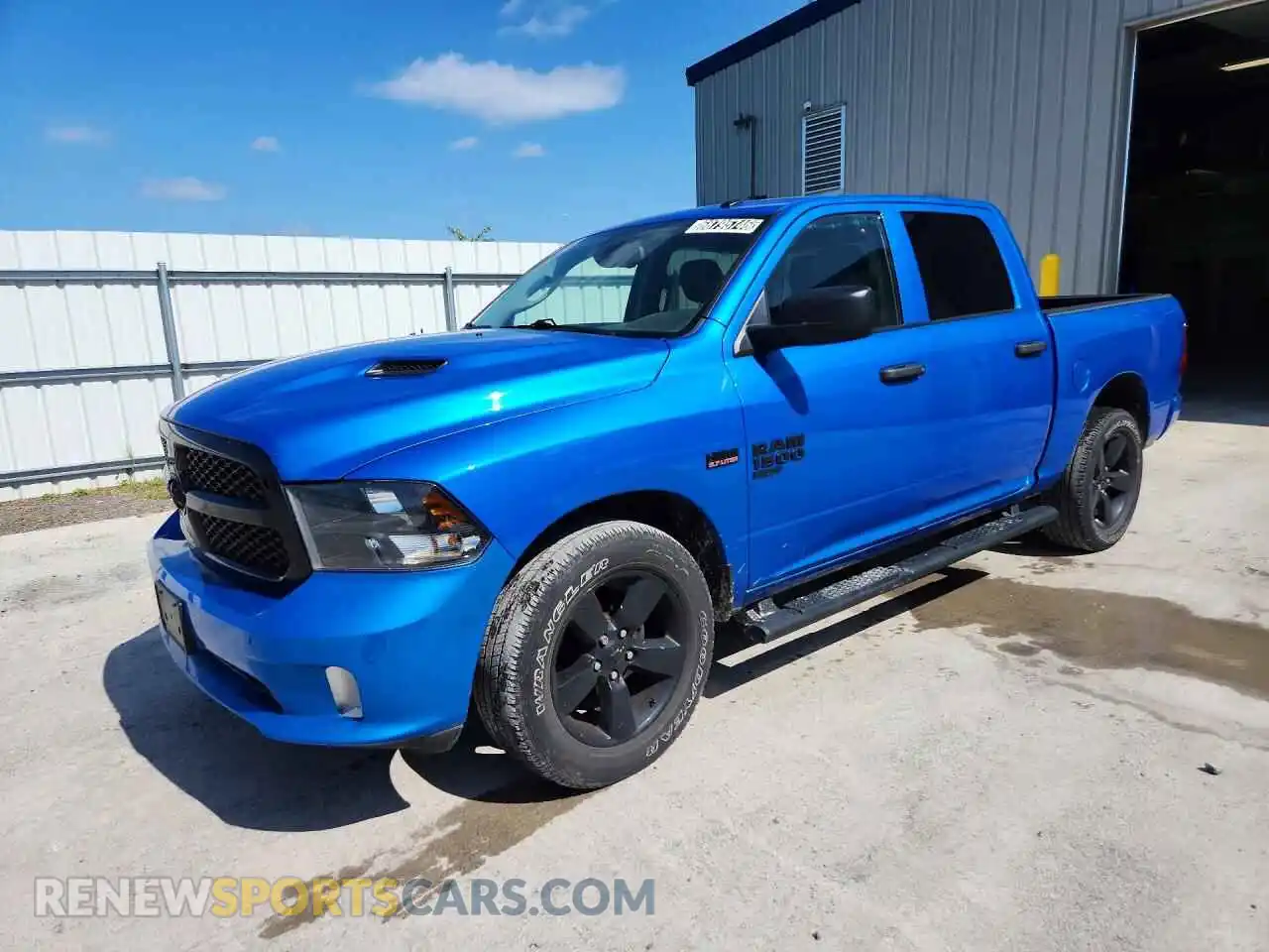 1 Photograph of a damaged car 3C6RR7KTXPG577788 RAM 1500 2023