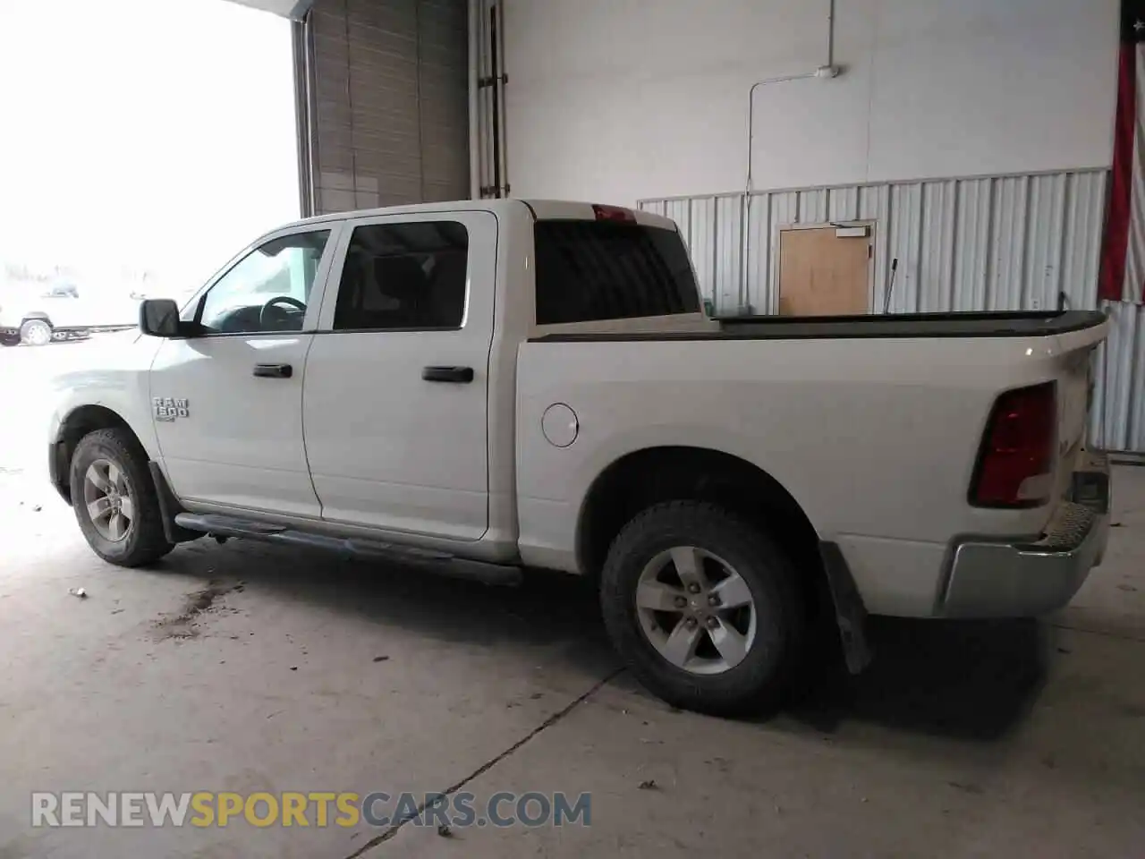 2 Photograph of a damaged car 3C6RR7LG4PG656522 RAM 1500 2023