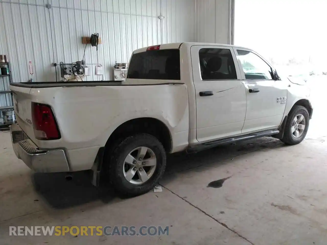 3 Photograph of a damaged car 3C6RR7LG4PG656522 RAM 1500 2023