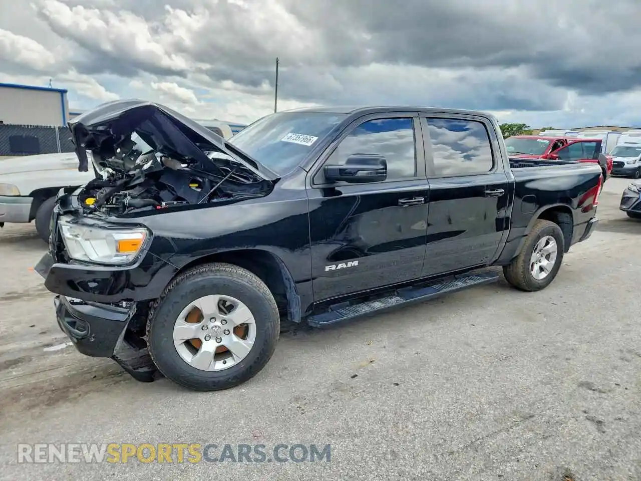 1 Photograph of a damaged car 1C6RREFG4RN123046 RAM 1500 2024