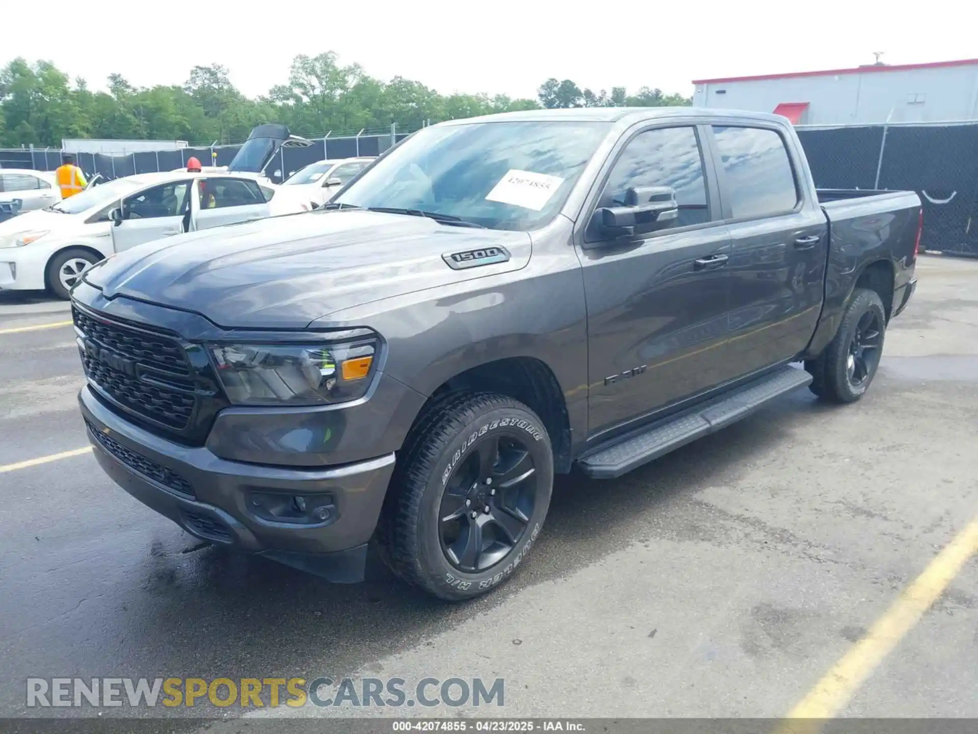 2 Photograph of a damaged car 1C6RREFT0RN191728 RAM 1500 2024