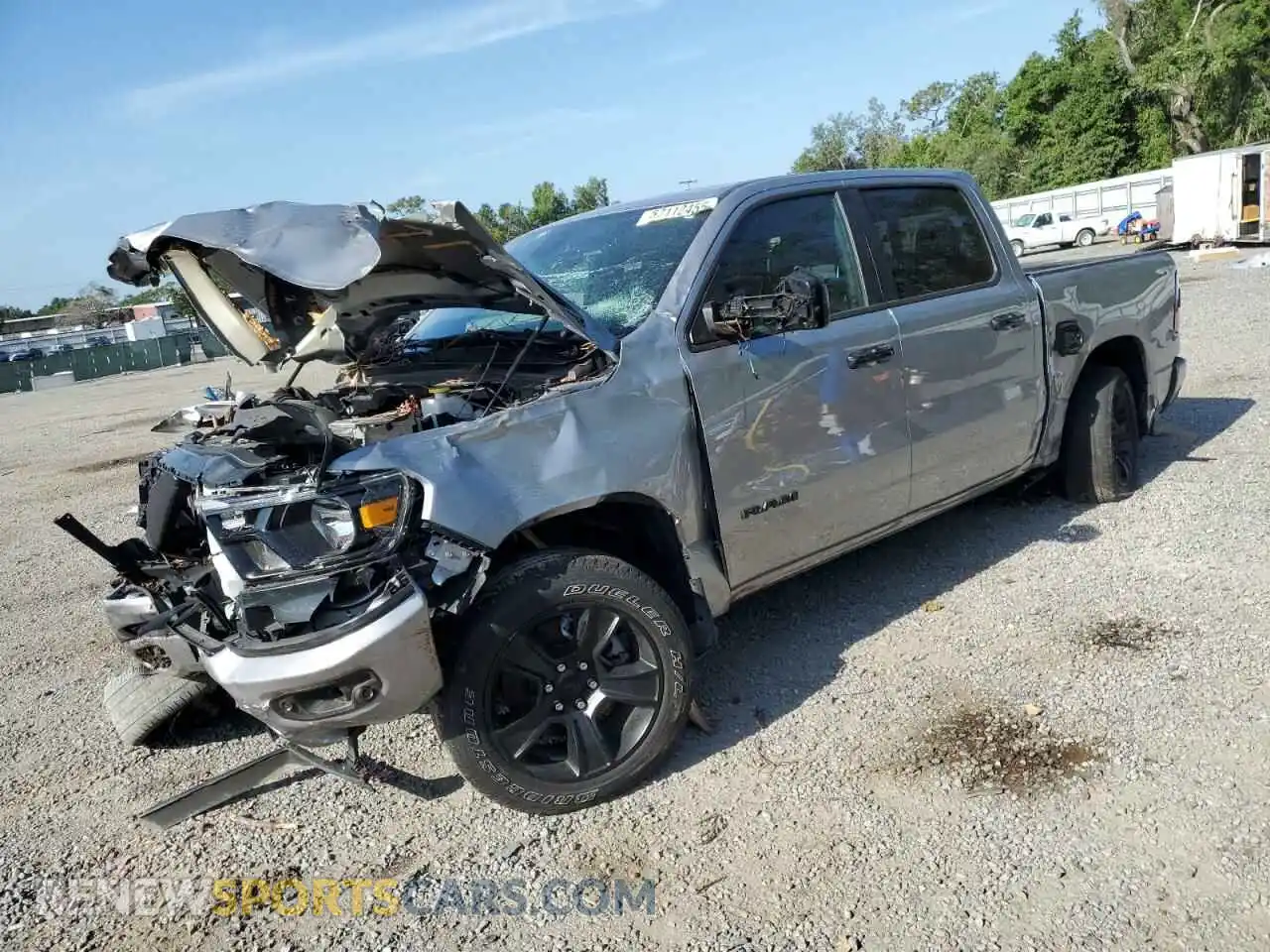 1 Photograph of a damaged car 1C6RREFT0RN195102 RAM 1500 2024