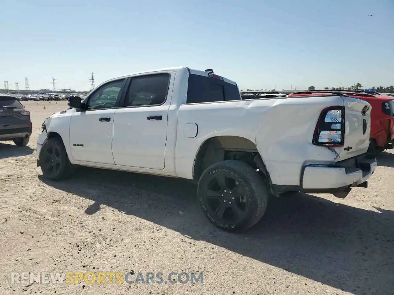 2 Photograph of a damaged car 1C6RREFT1RN146040 RAM 1500 2024
