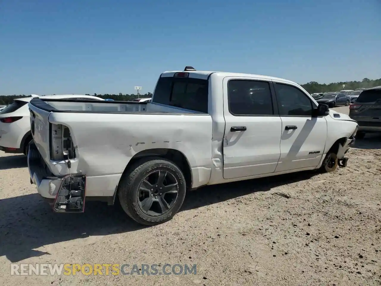 3 Photograph of a damaged car 1C6RREFT1RN146040 RAM 1500 2024