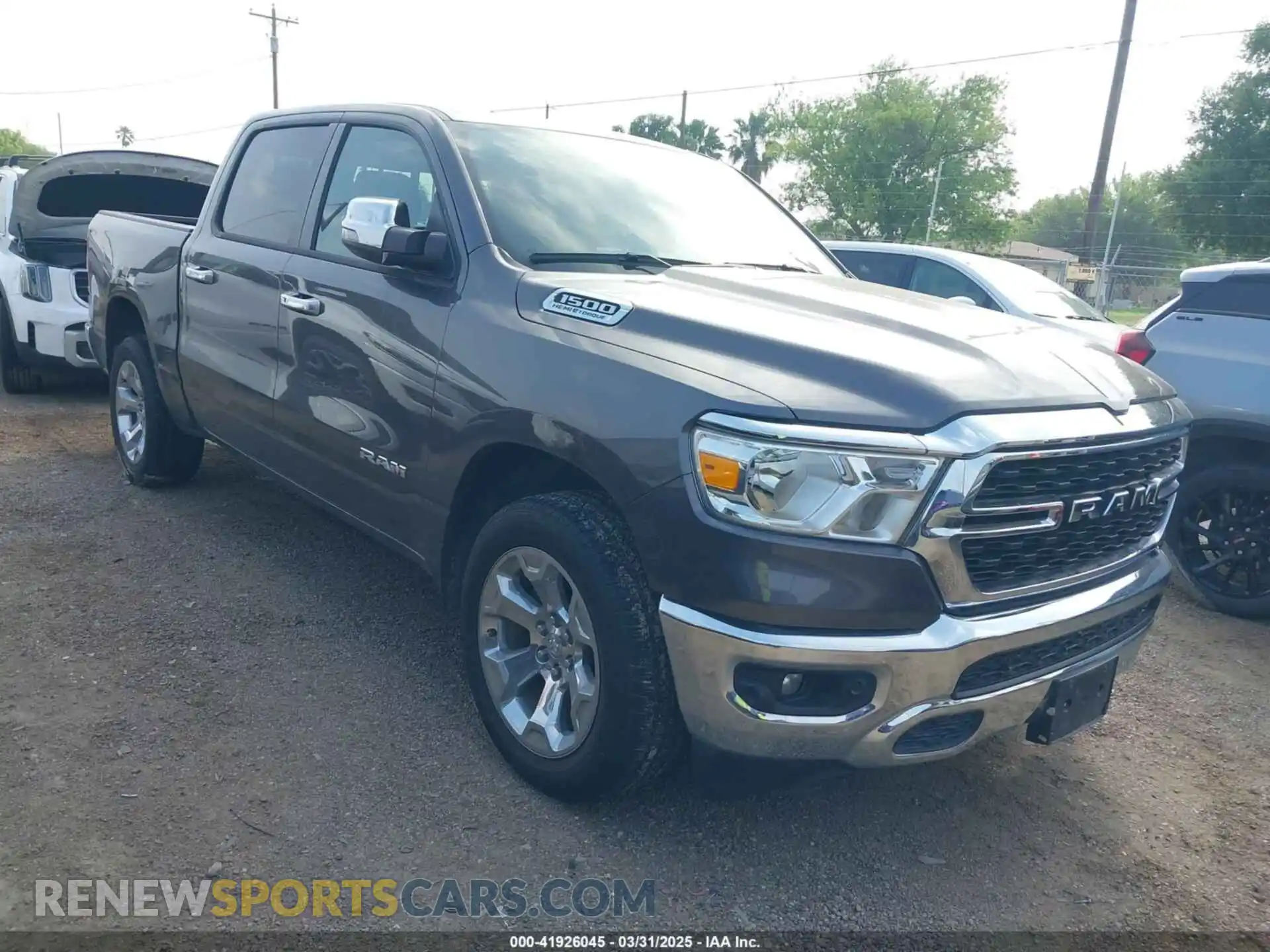 1 Photograph of a damaged car 1C6RREFT2RN122894 RAM 1500 2024