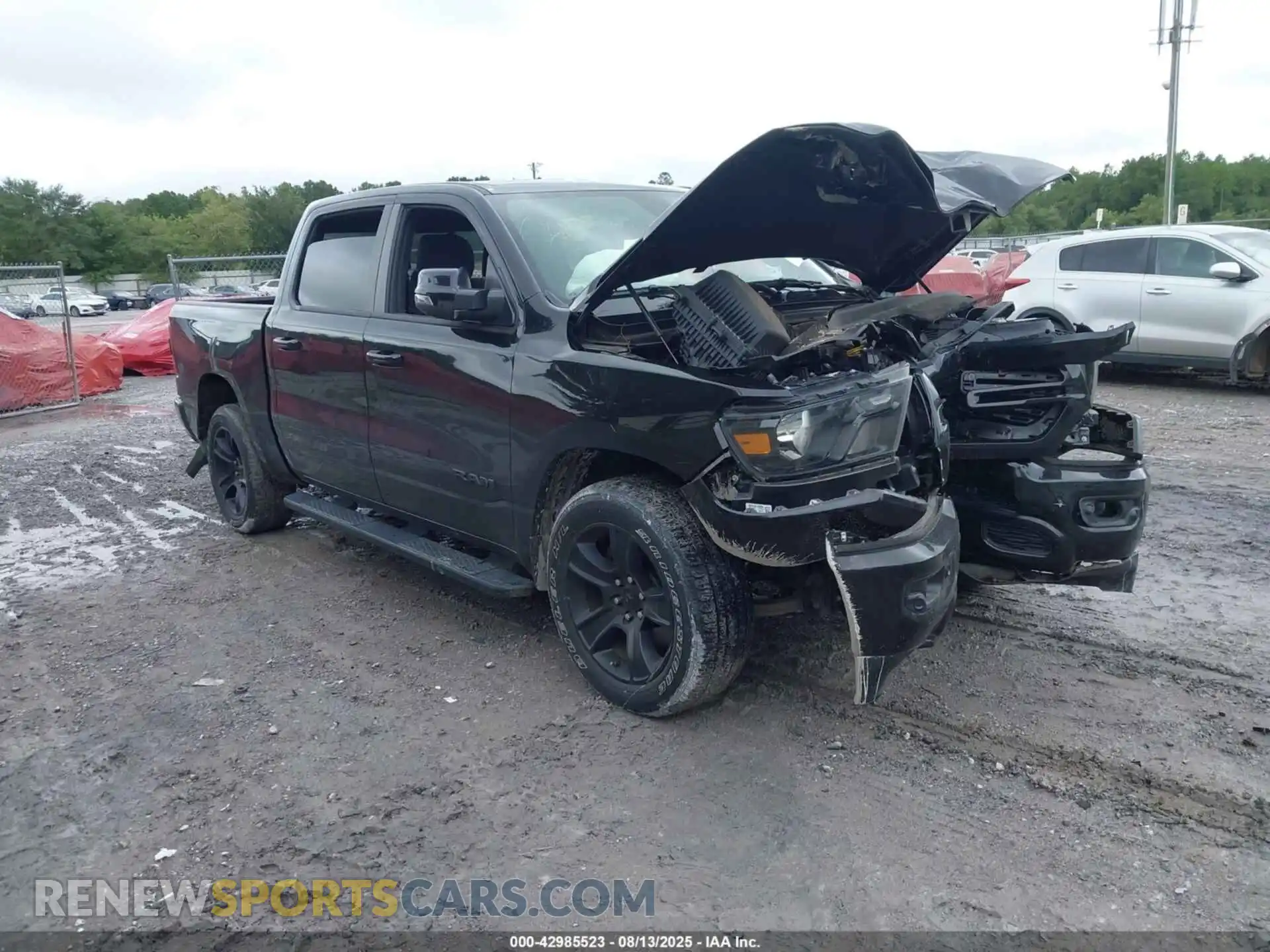 1 Photograph of a damaged car 1C6RREFT4RN140300 RAM 1500 2024