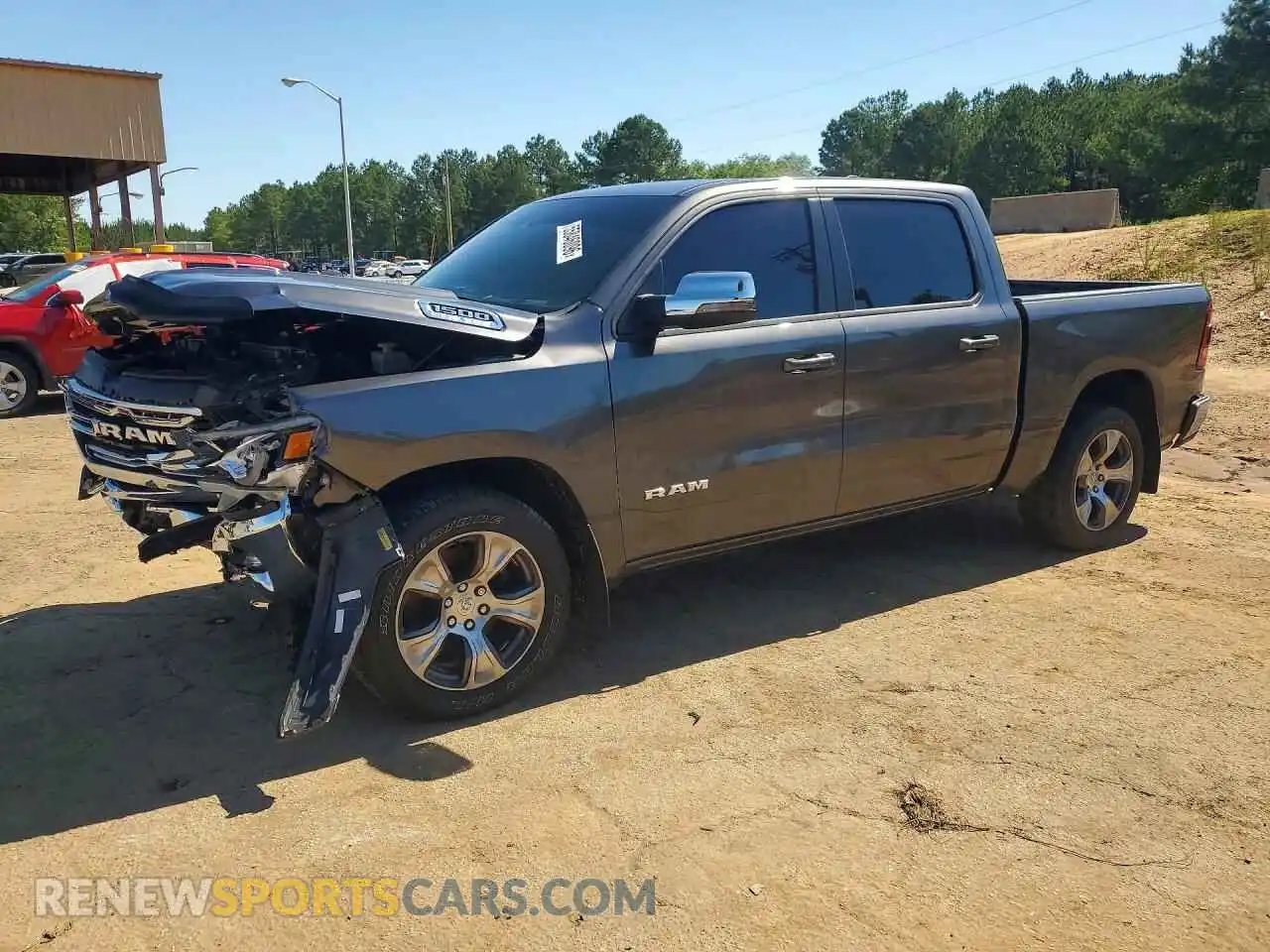 1 Photograph of a damaged car 1C6RREJT1RN128497 RAM 1500 2024