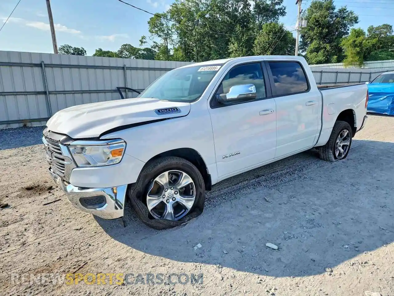 1 Photograph of a damaged car 1C6RREJT7RN205115 RAM 1500 2024
