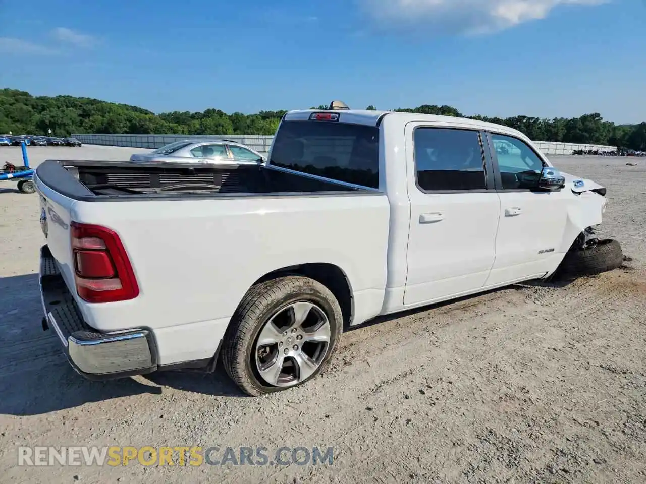 3 Photograph of a damaged car 1C6RREJT7RN205115 RAM 1500 2024