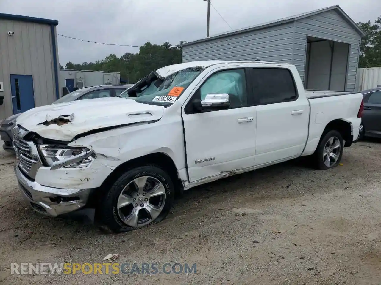 1 Photograph of a damaged car 1C6RREJT7RN219967 RAM 1500 2024