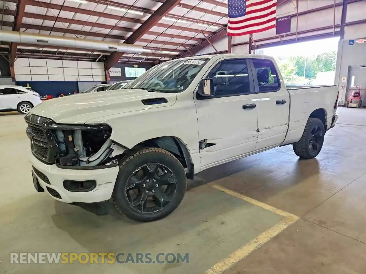 1 Photograph of a damaged car 1C6RRFCG7RN230408 RAM 1500 2024