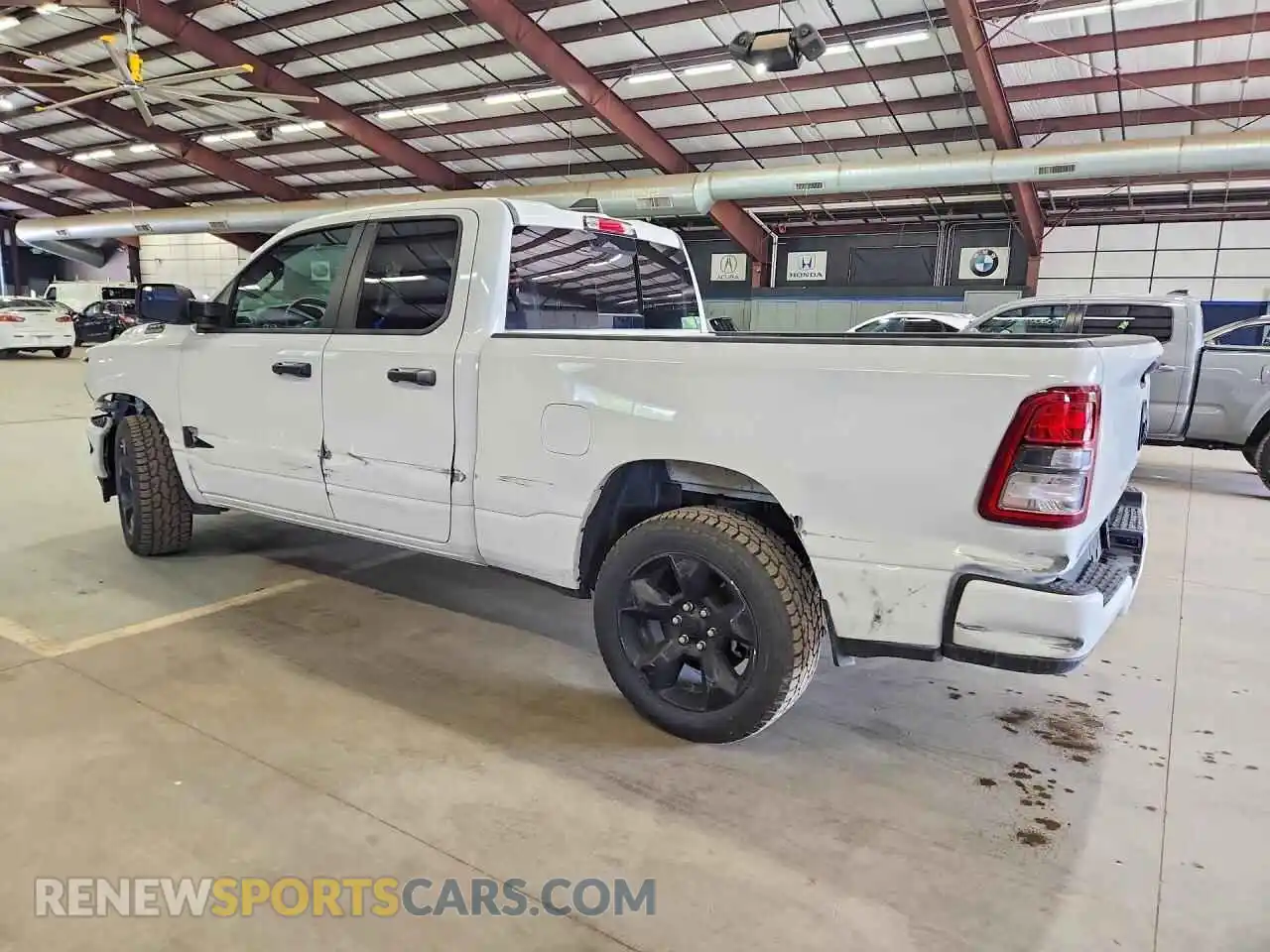 2 Photograph of a damaged car 1C6RRFCG7RN230408 RAM 1500 2024