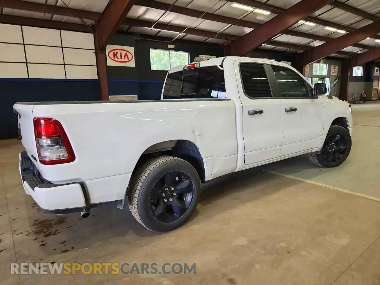 3 Photograph of a damaged car 1C6RRFCG7RN230408 RAM 1500 2024