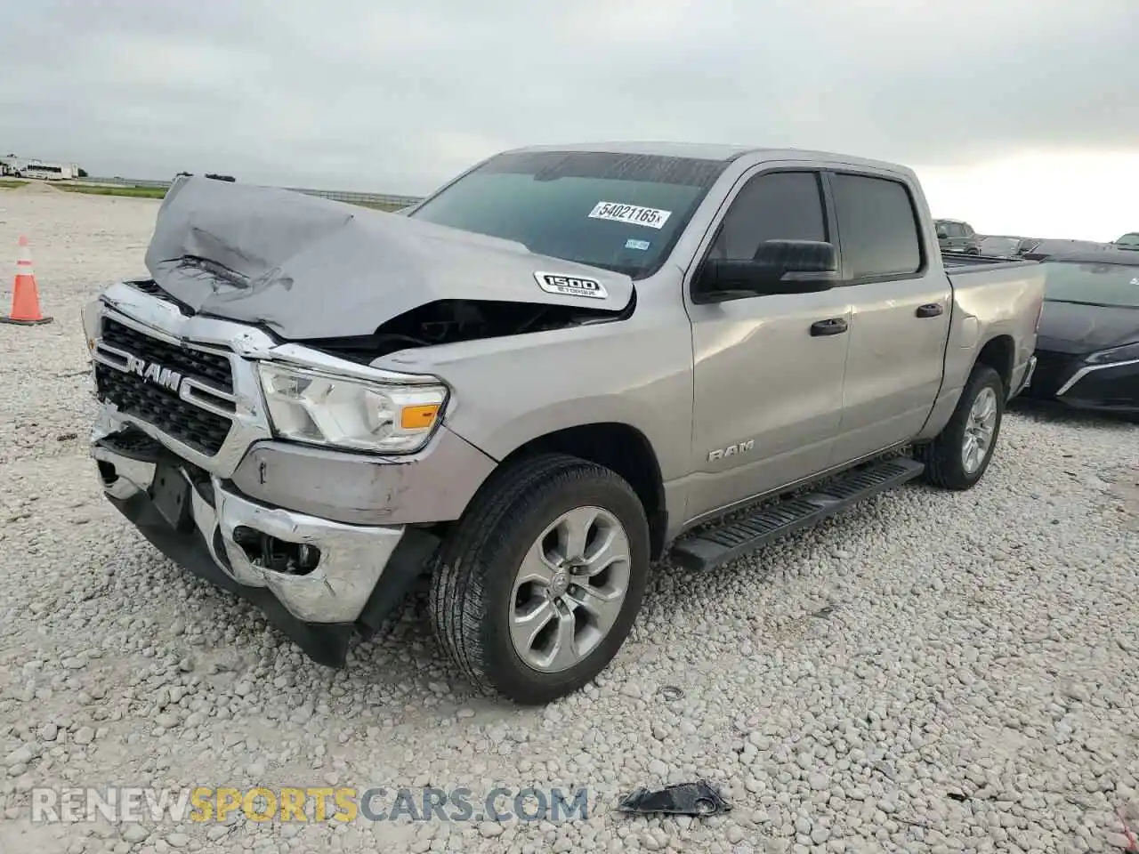 1 Photograph of a damaged car 1C6RRFFG4RN209592 RAM 1500 2024