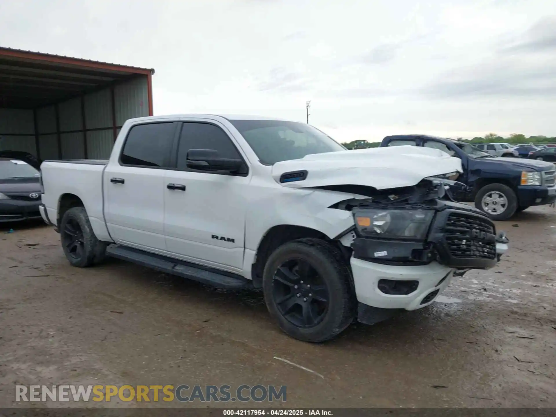 1 Photograph of a damaged car 1C6RRFFG6RN230332 RAM 1500 2024