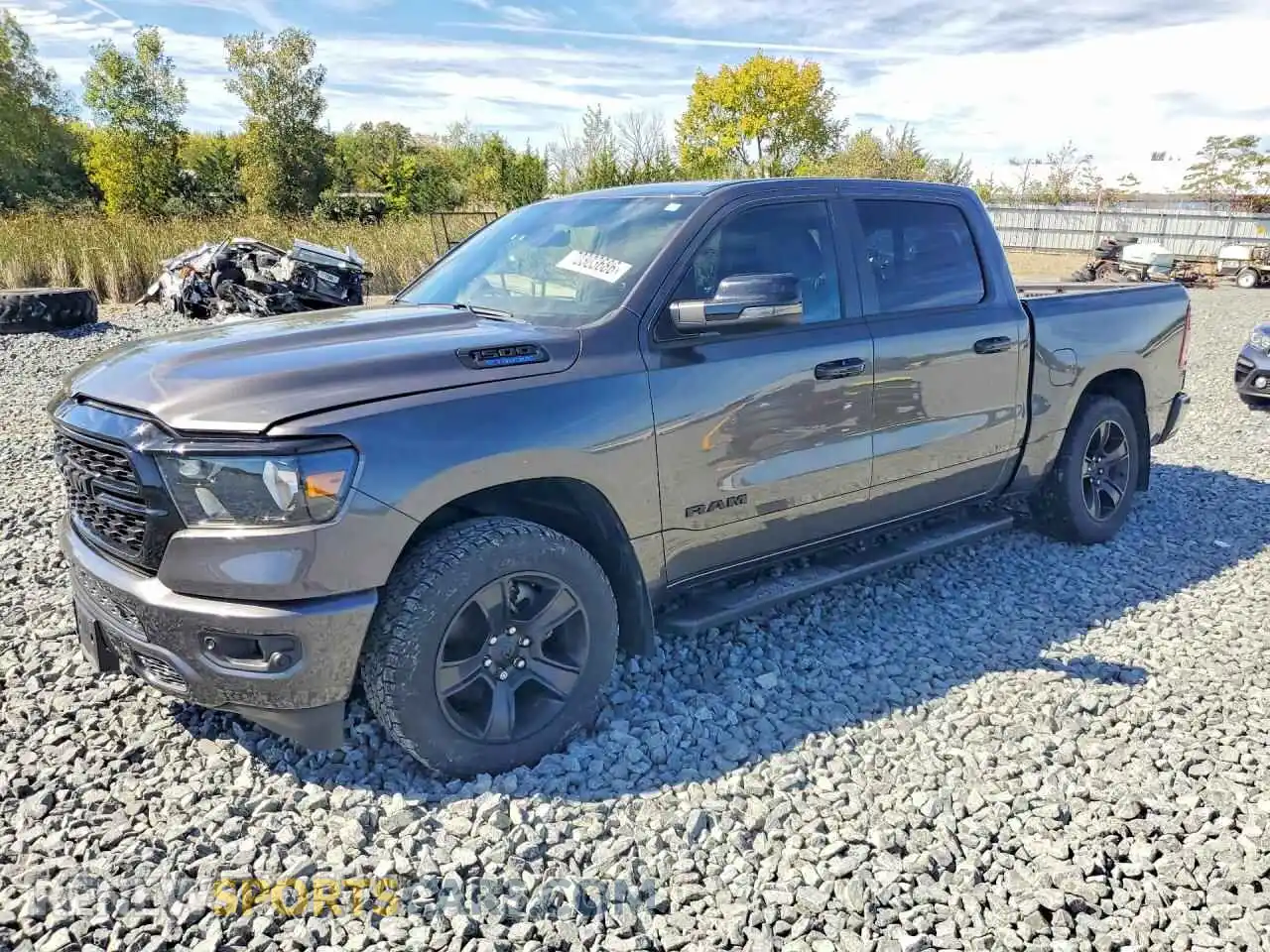 1 Photograph of a damaged car 1C6RRFFG9RN227196 RAM 1500 2024