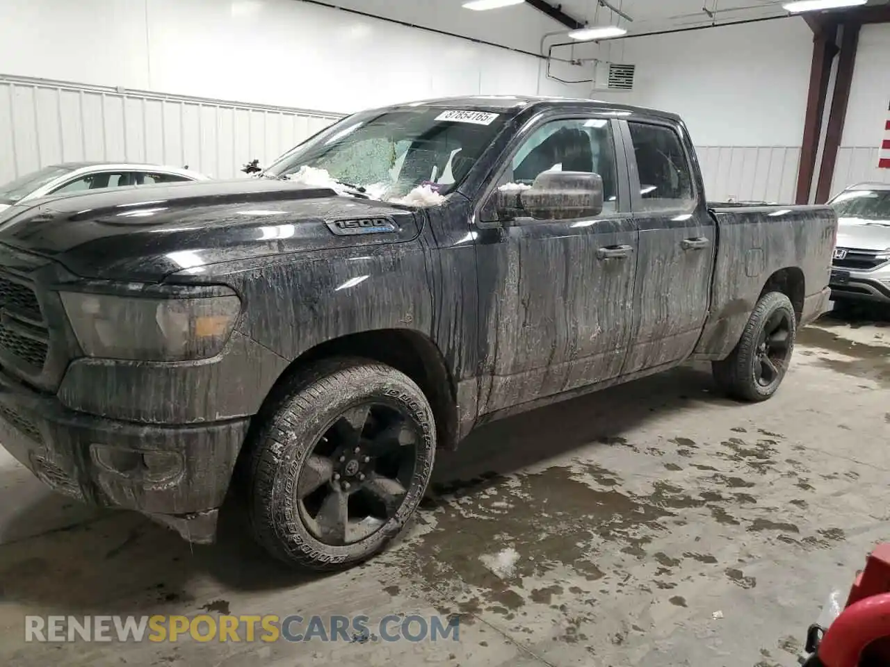 1 Photograph of a damaged car 1C6SRFCT4RN160784 RAM 1500 2024