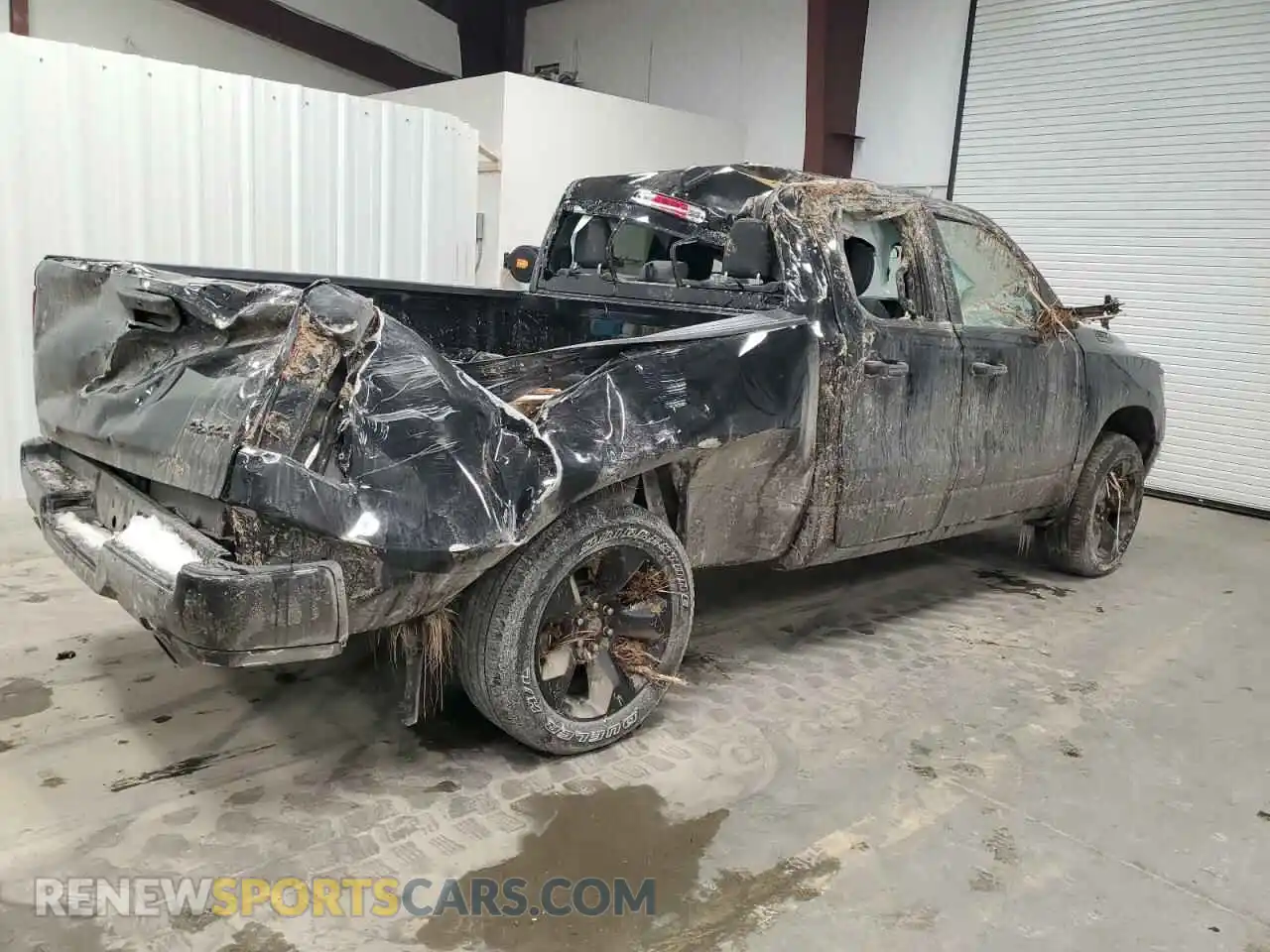 3 Photograph of a damaged car 1C6SRFCT4RN160784 RAM 1500 2024
