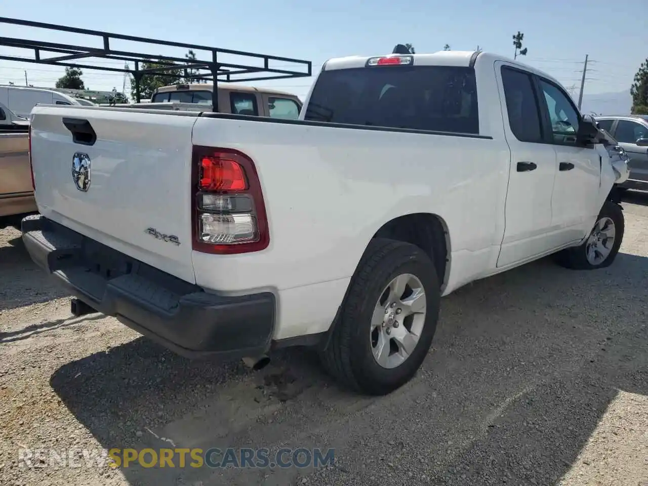 3 Photograph of a damaged car 1C6SRFCT5RN111206 RAM 1500 2024