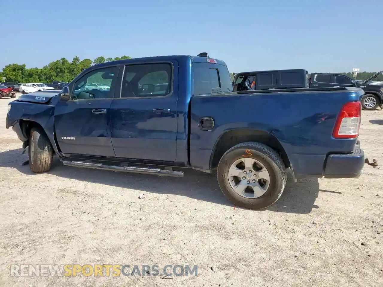 2 Photograph of a damaged car 1C6SRFFT0RN104272 RAM 1500 2024