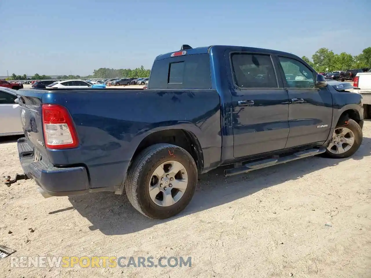 3 Photograph of a damaged car 1C6SRFFT0RN104272 RAM 1500 2024