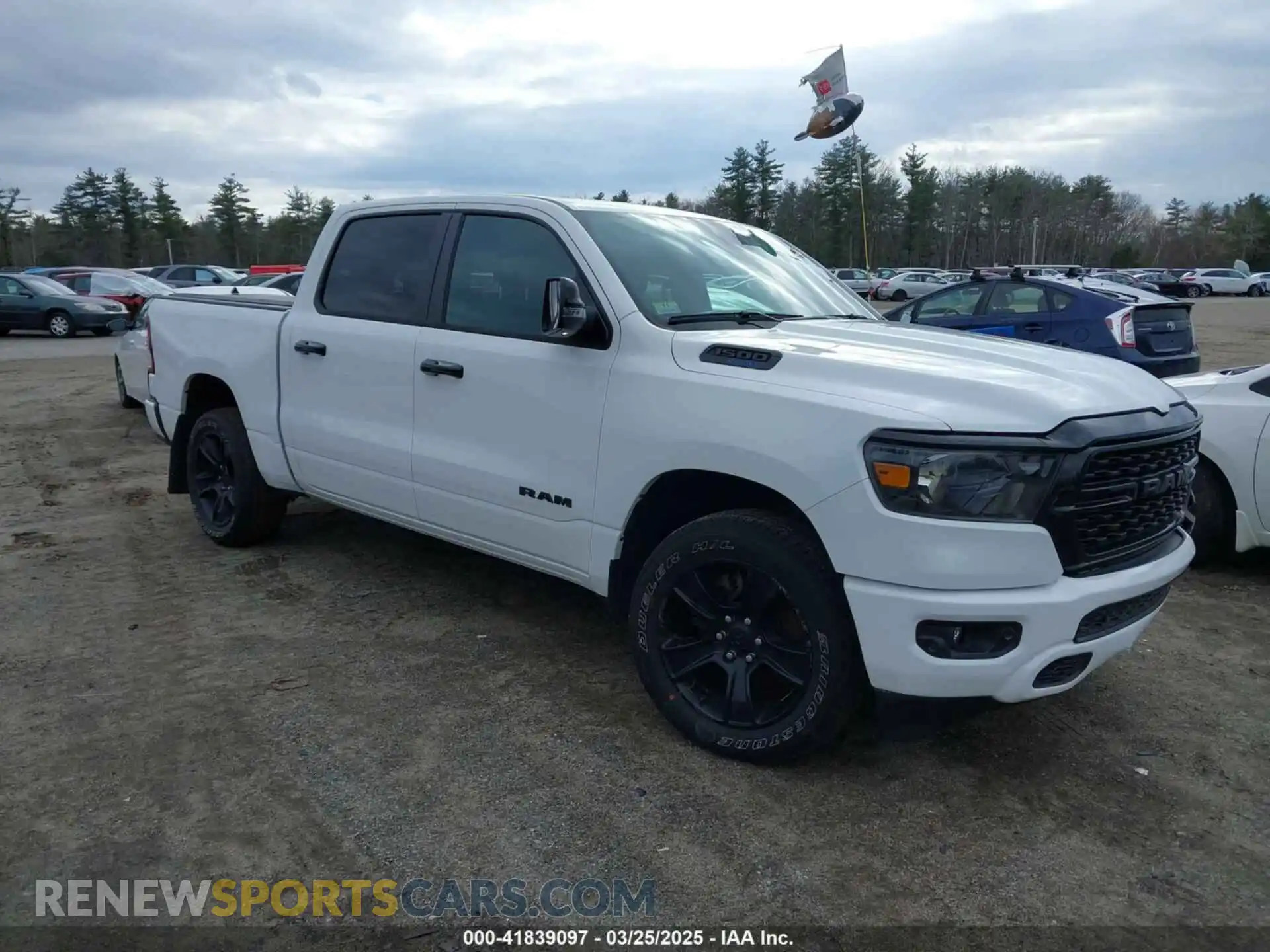 1 Photograph of a damaged car 1C6SRFFT1RN124465 RAM 1500 2024