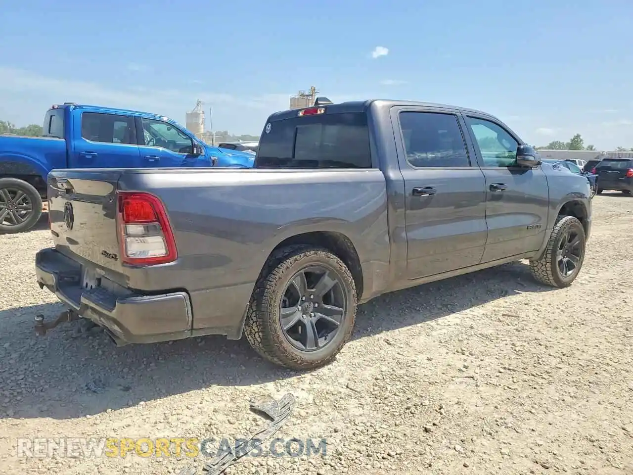 3 Photograph of a damaged car 1C6SRFFT3RN115668 RAM 1500 2024
