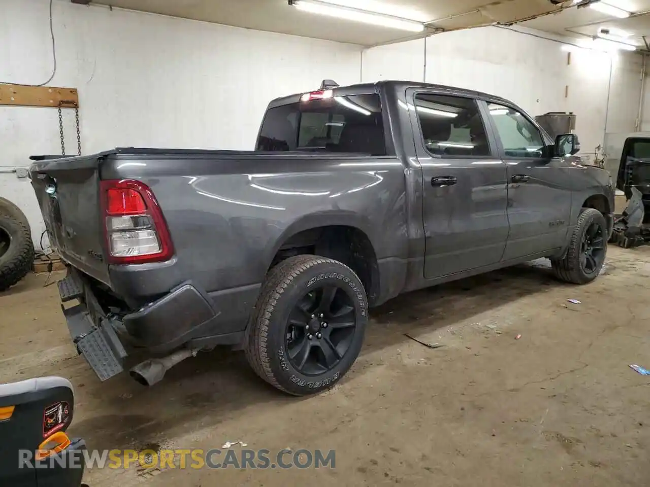3 Photograph of a damaged car 1C6SRFFT4RN231607 RAM 1500 2024