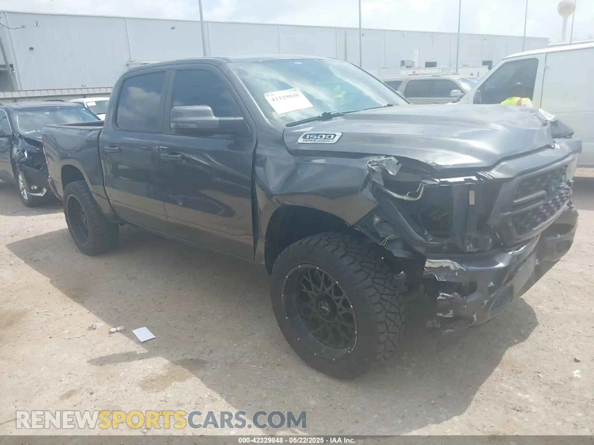 1 Photograph of a damaged car 1C6SRFFT5RN184572 RAM 1500 2024