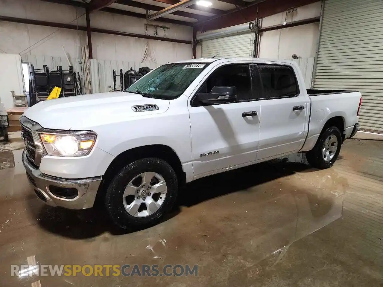 1 Photograph of a damaged car 1C6SRFFT5RN208014 RAM 1500 2024