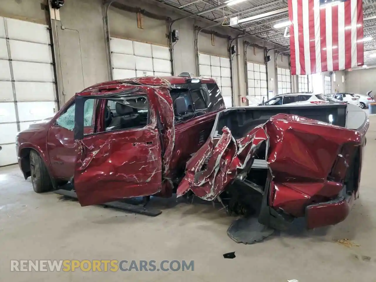 2 Photograph of a damaged car 1C6SRFHT8RN212118 RAM 1500 2024