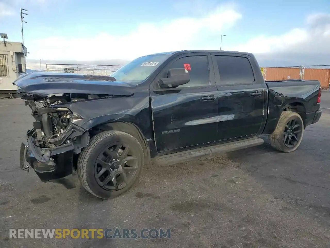 1 Photograph of a damaged car 1C6SRFJT1RN116051 RAM 1500 2024