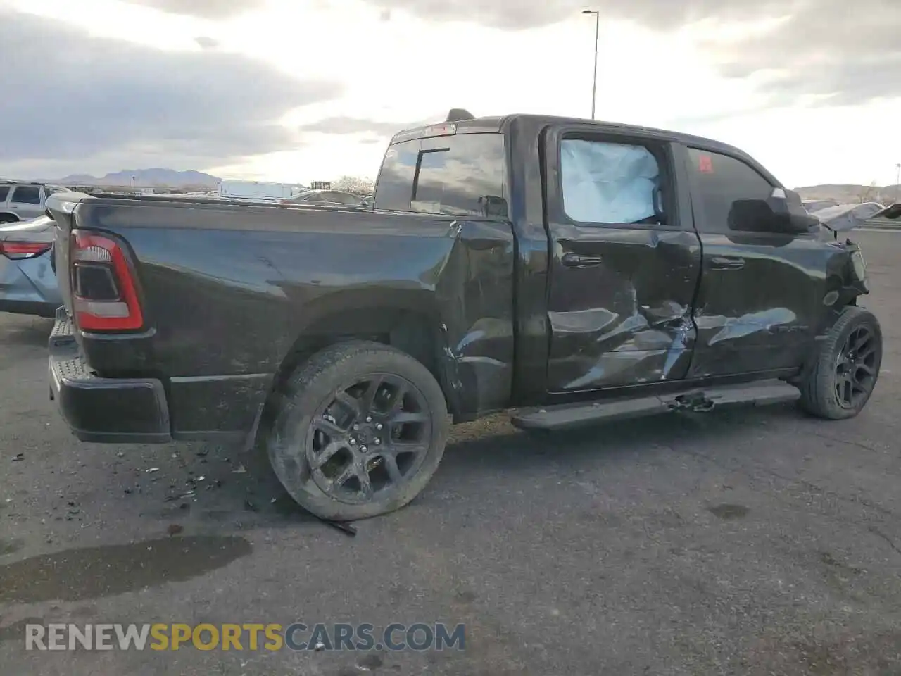 3 Photograph of a damaged car 1C6SRFJT1RN116051 RAM 1500 2024