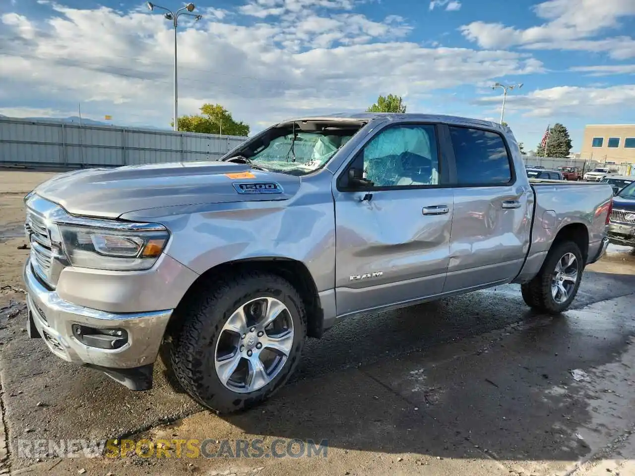 1 Photograph of a damaged car 1C6SRFJT1RN143752 RAM 1500 2024