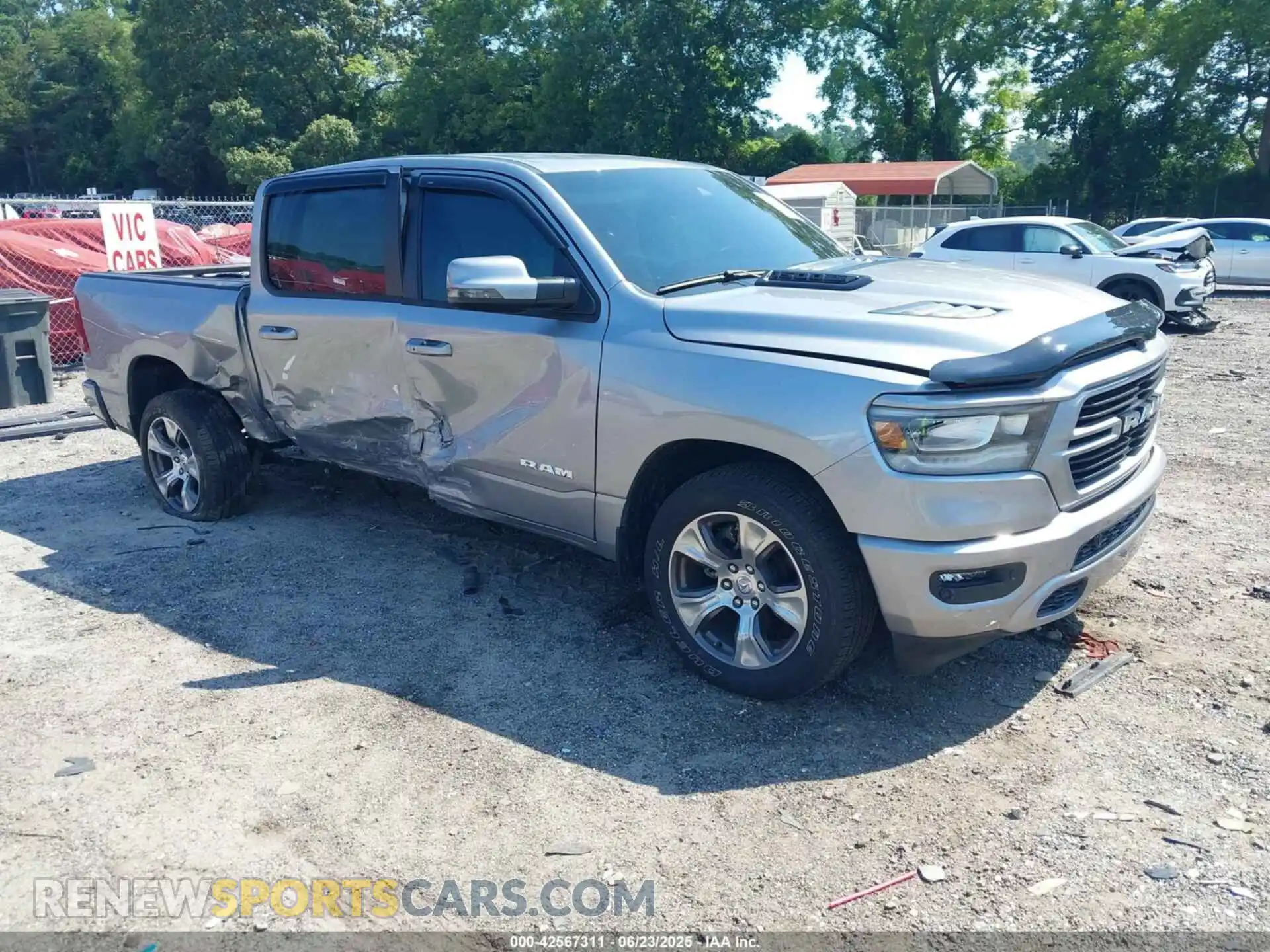 1 Photograph of a damaged car 1C6SRFJT2RN107679 RAM 1500 2024