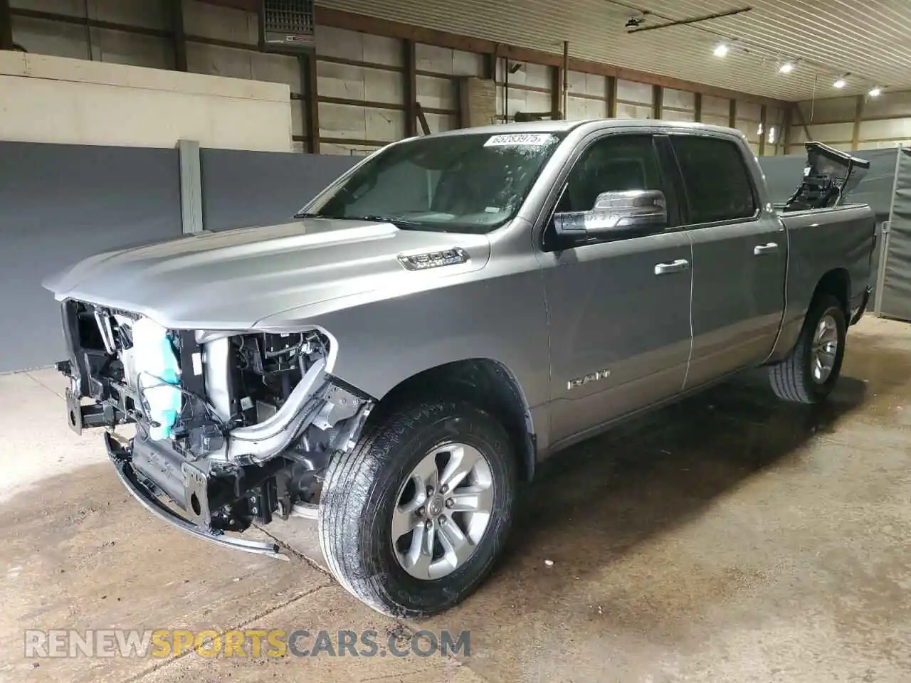 1 Photograph of a damaged car 1C6SRFJT5RN223670 RAM 1500 2024
