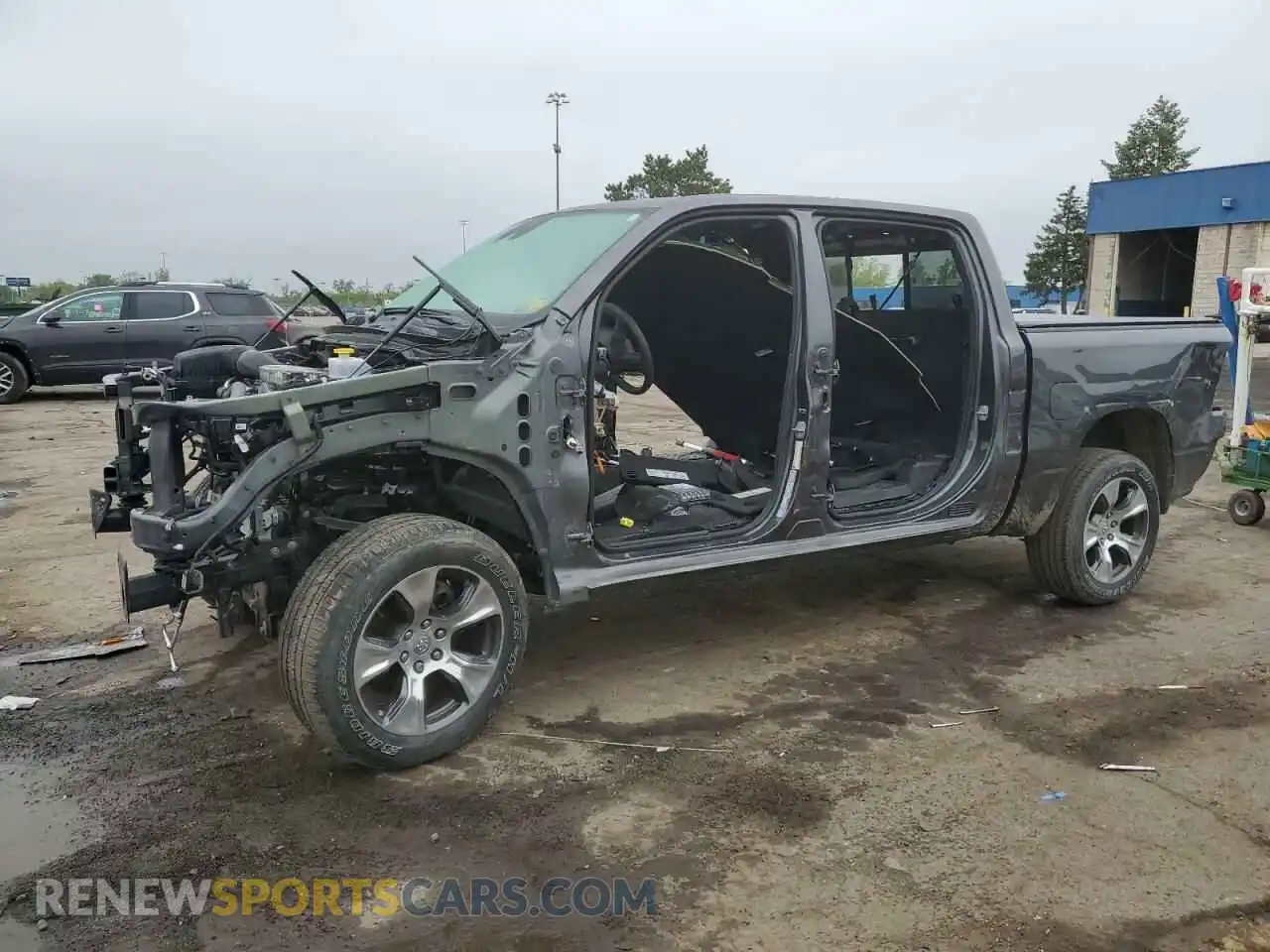 1 Photograph of a damaged car 1C6SRFJT6RN143830 RAM 1500 2024