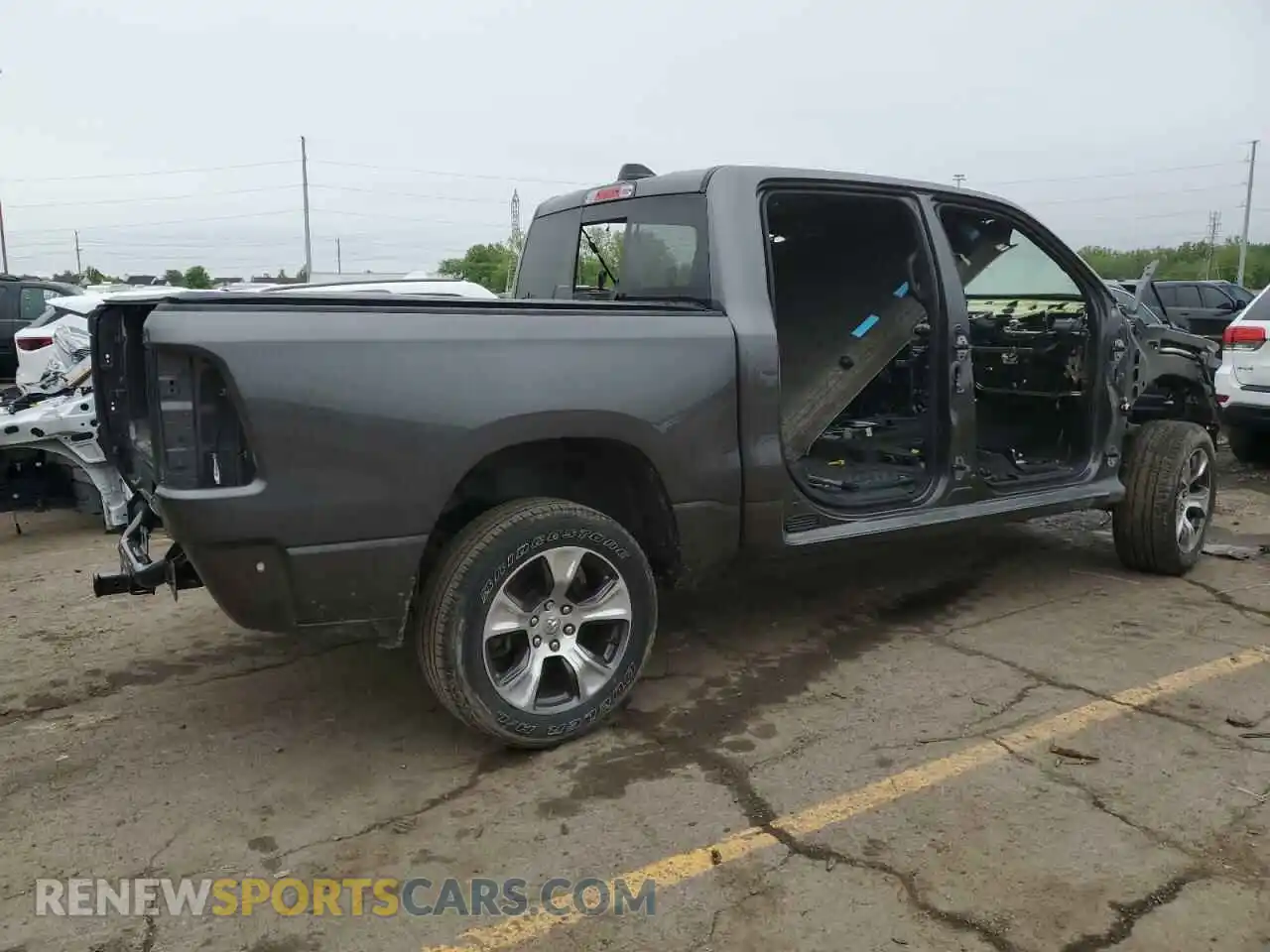 3 Photograph of a damaged car 1C6SRFJT6RN143830 RAM 1500 2024