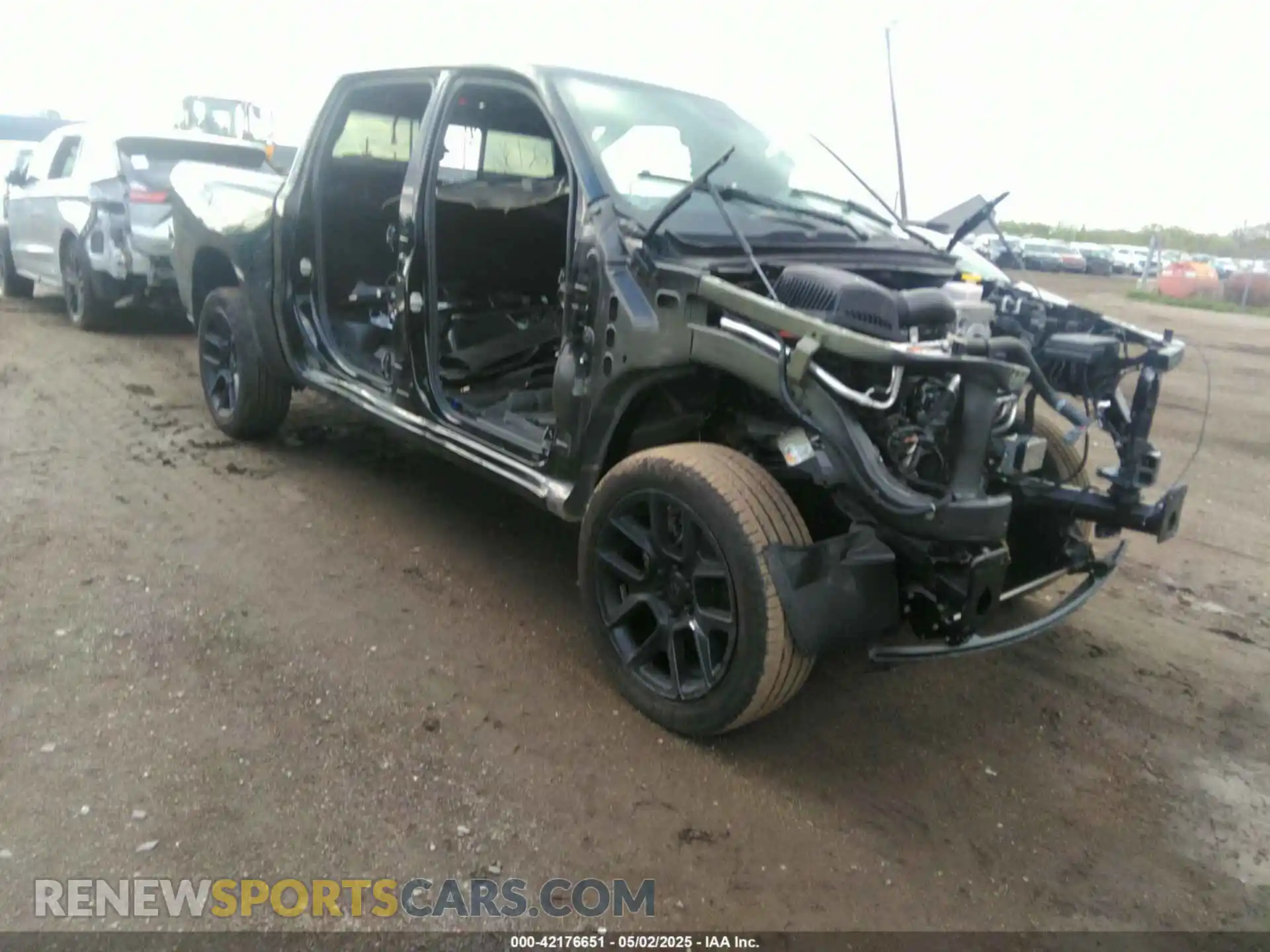 1 Photograph of a damaged car 1C6SRFJT6RN192736 RAM 1500 2024