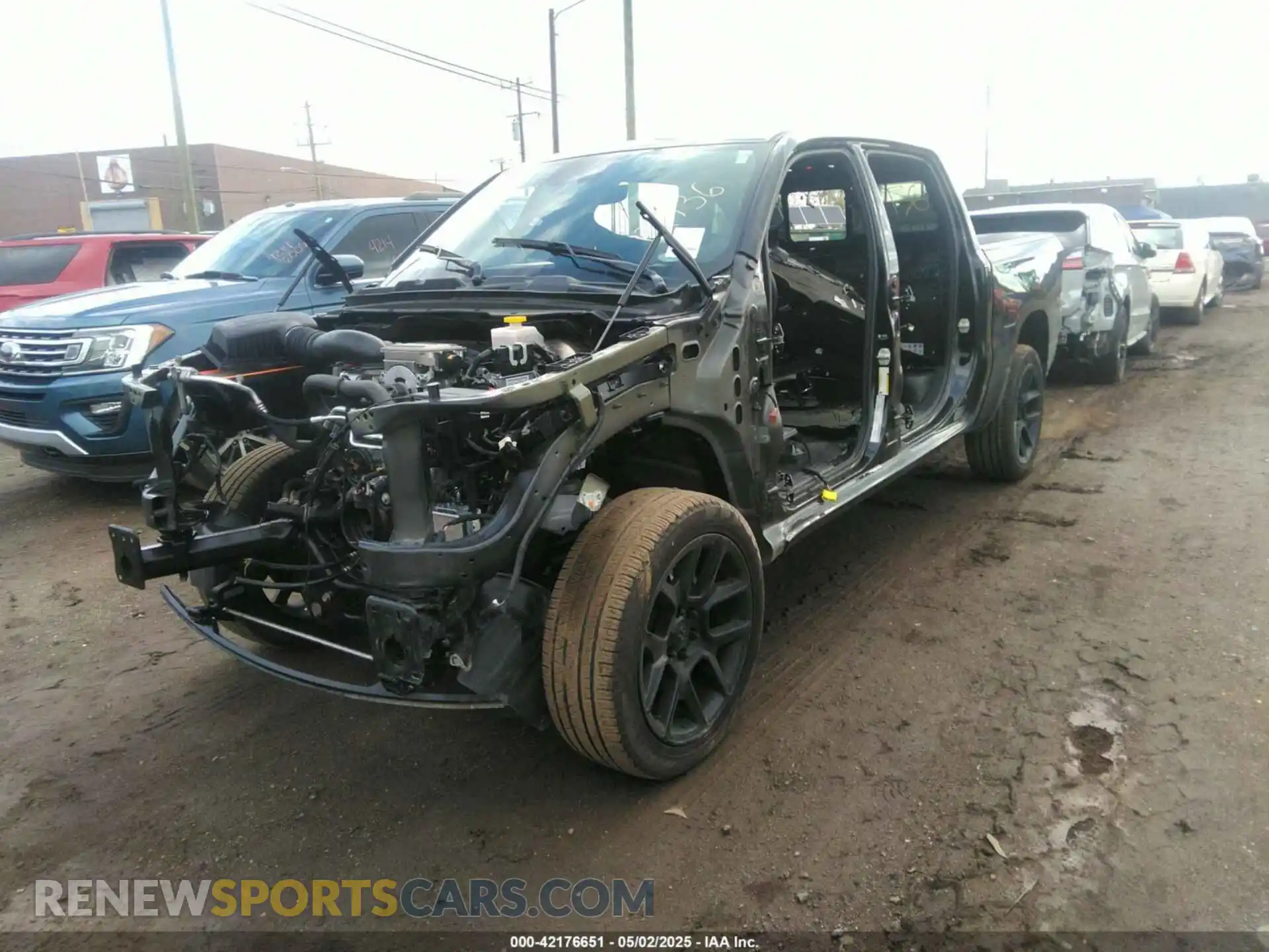 2 Photograph of a damaged car 1C6SRFJT6RN192736 RAM 1500 2024